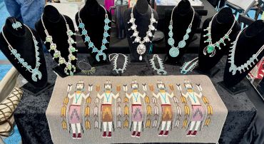 Native American turquoise jewelry and beaded artwork display.