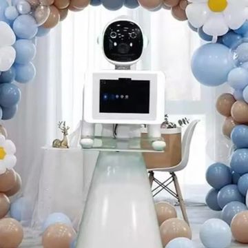  The Roaming Robot Booth is an autonomous, mobile robot that interacts with guests and captures pics