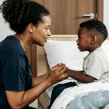 Support worker assisting a resident in a care home in Walsall, West Midlands