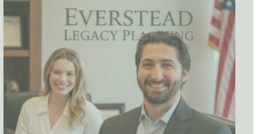 Two professionals posing at an office of Everstead Legacy Planning.