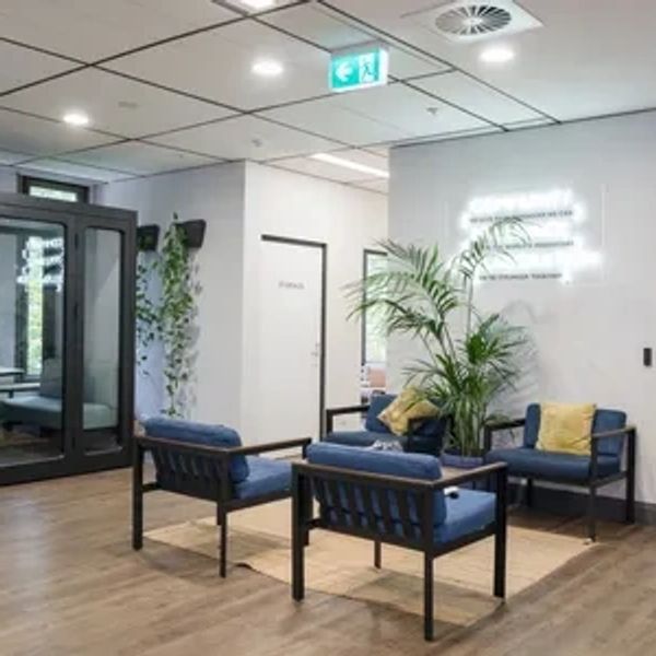 Comfortable therapy office in Stoneham MA with welcoming seating area