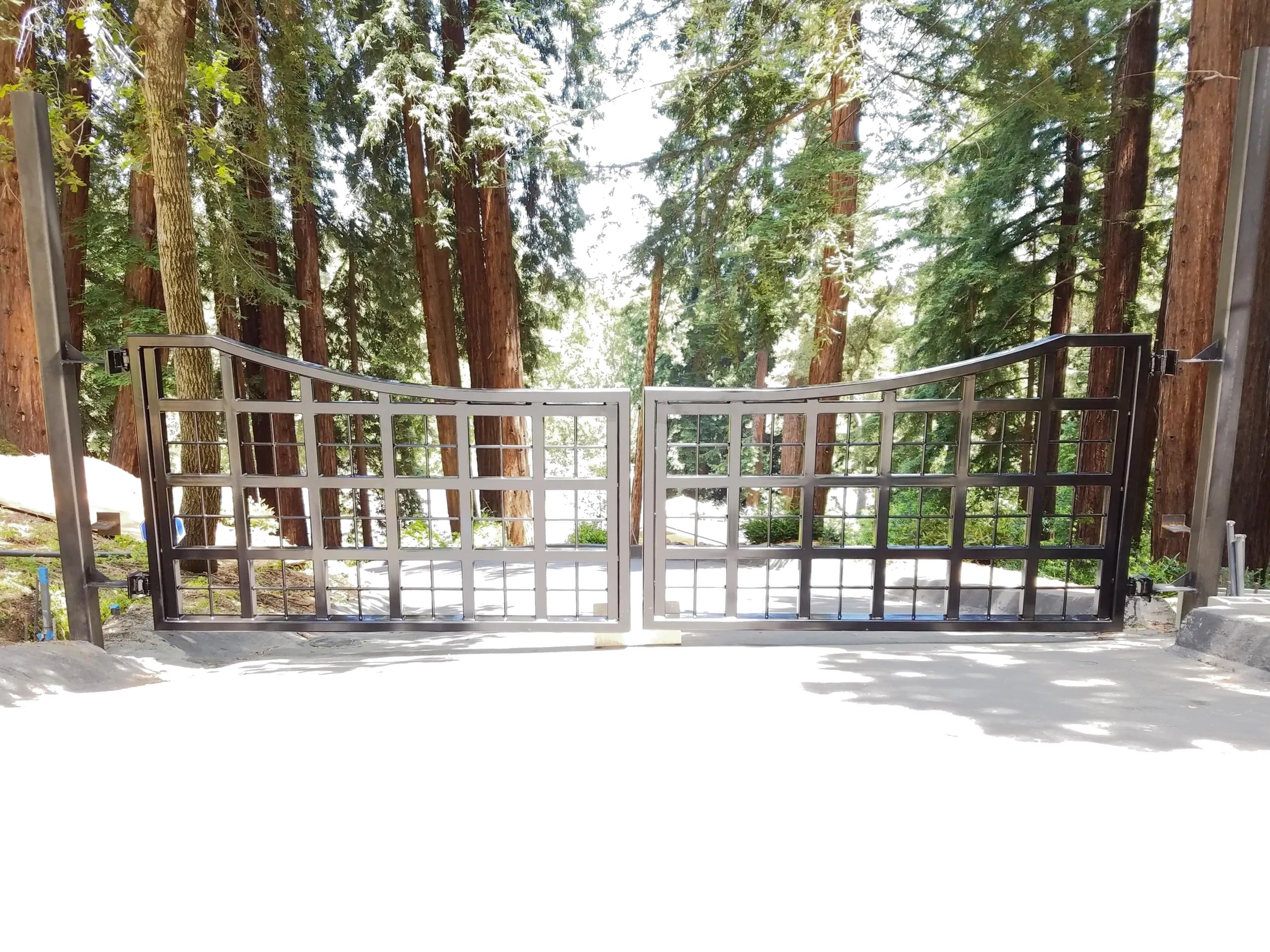 modern fence in forested area.