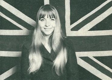 Annie Philippe in front of Birtish flag in London in the 60's