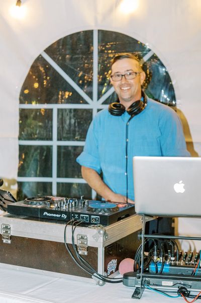 Tristan Berrini. Wedding DJ. Wedding reception. Small DJ setup. 