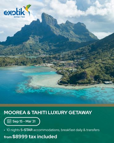 Scenic aerial view of Moorea island with turquoise waters and lush mountains.