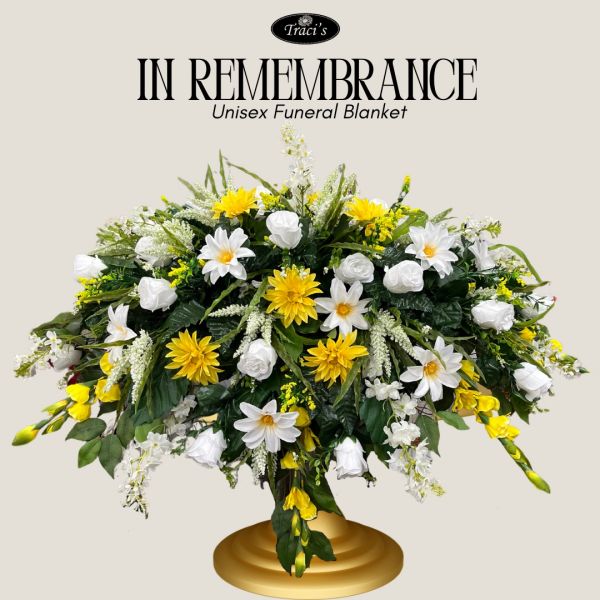 A vibrant floral arrangement with white and yellow flowers on a gold stand.