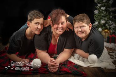 Mother and her children in Christmas scene.