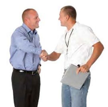 Two men shaking hands, one holding a clipboard.