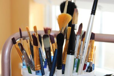 Close up photograph of paint brushes. 
