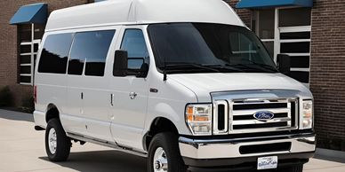 A White Color Van Placed In A Parking Area