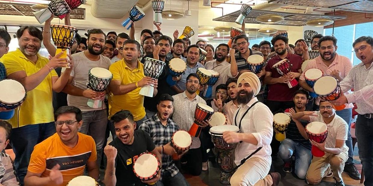 Group of people in a drum circle