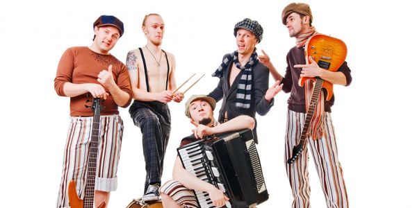 Group of people holding musical instruments