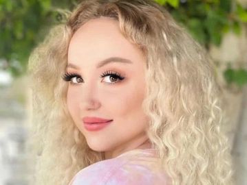 hairstylist and makeup artist who specializes in fantasy color hair and makeup 