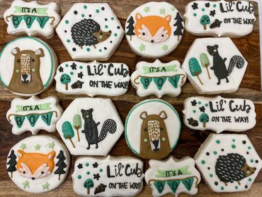 Lil Cub theme decorated sugar cookies with forest animals. 