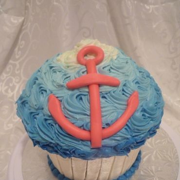 Nautical theme giant cupcake smash cake in buttercream with fondant anchor. 