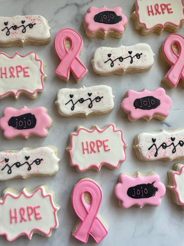 Breast Cancer survivor cookies including a pink ribbon cookie. 