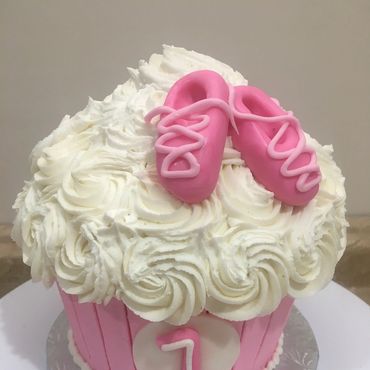 Ballet theme giant cupcake smash cake with fondant ballet shoes. 