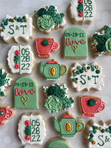 Decorative cookies with floral, tea, and love themes for a special date.