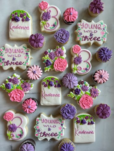 Young Wild and Three themed sugar cookies with beautiful floral details. 