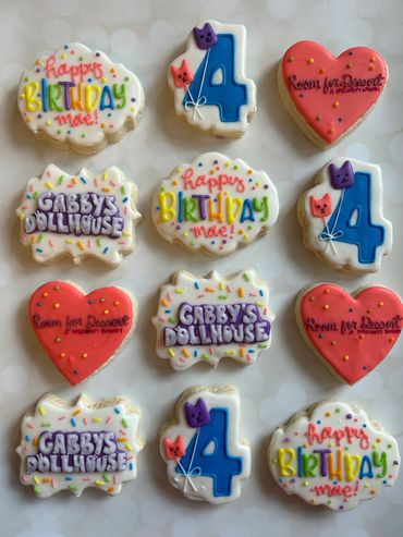 Gabby's Dollhouse cookies with a heart and bright colours. 