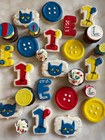 Pete the Cat themed sugar cookies with buttons. 