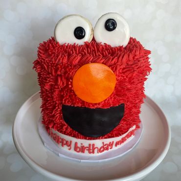 A buttercream cake of Elmo