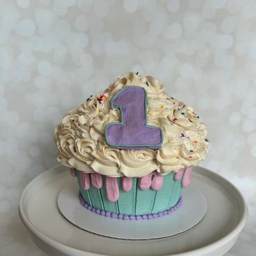 Birthday sprinkle theme giant smash cupcake. 