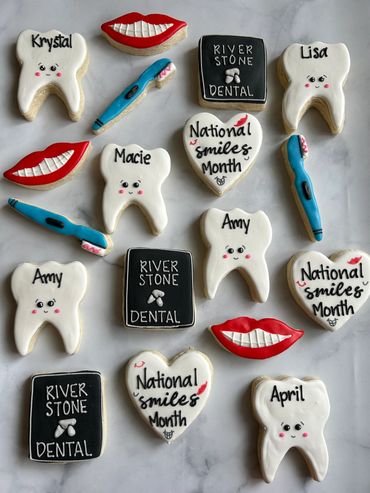 Dentist theme decorated sugar cookies with a tooth, lips and a toothbrush. 