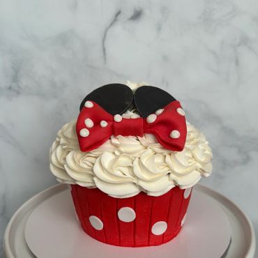 Minnie Mouse theme giant cupcake cake for a cake smash