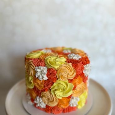 Multicolor multi tip piping fall theme cake. 