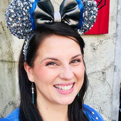 Travel agent mom wearing Bo-Katan inspired ears at Disney World's Hollywood Studios Galaxy's Edge
