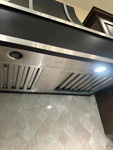 BEFORE... Replaced the hood light — bringing brightness back to the kitchen!