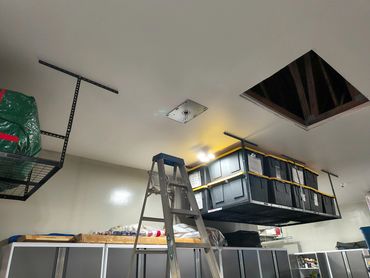 Lighting upgrade complete: flat panel garage lights installed by Ellia Electric Inc.