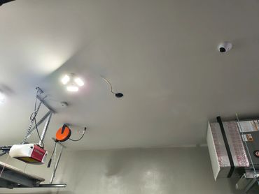 Lighting upgrade complete: flat panel garage lights installed by Ellia Electric Inc.