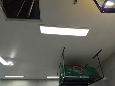 Lighting upgrade complete: flat panel garage lights installed by Ellia Electric Inc.