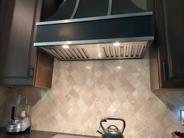 AFTER... Replaced the hood light — bringing brightness back to the kitchen!