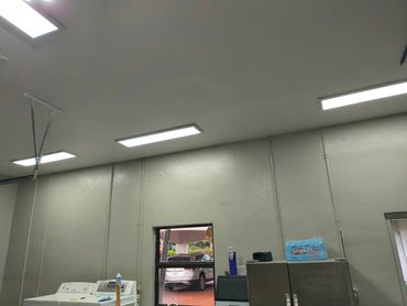 Lighting upgrade complete: flat panel garage lights installed by Ellia Electric Inc.