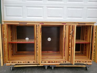 Inside look at a special order Entertainment Center. Built with our signature multiwood look