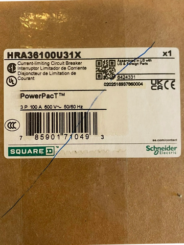 Label on a circuit breaker box by Schneider Electric with specifications and barcode.