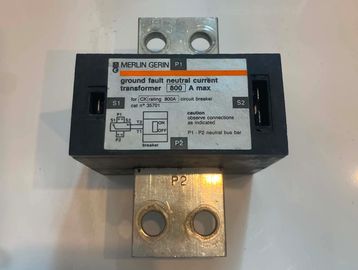 Ground fault neutral current transformer device.