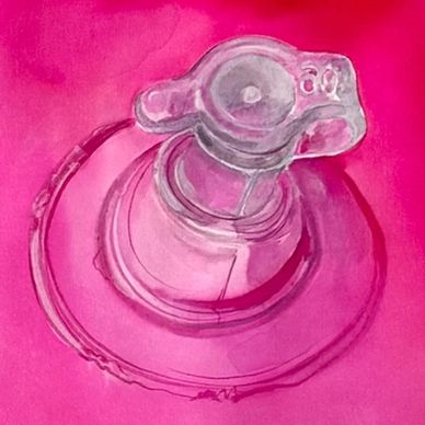 Close-up of a transparent medical valve against a pink background.