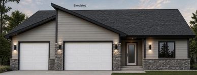 Modern single-story house with three garages and stone accents.