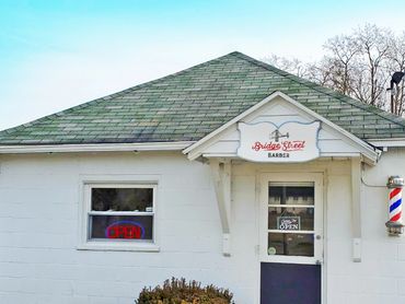 View of the Bridget Street Barber store front located in Phoenixville, PA 19460