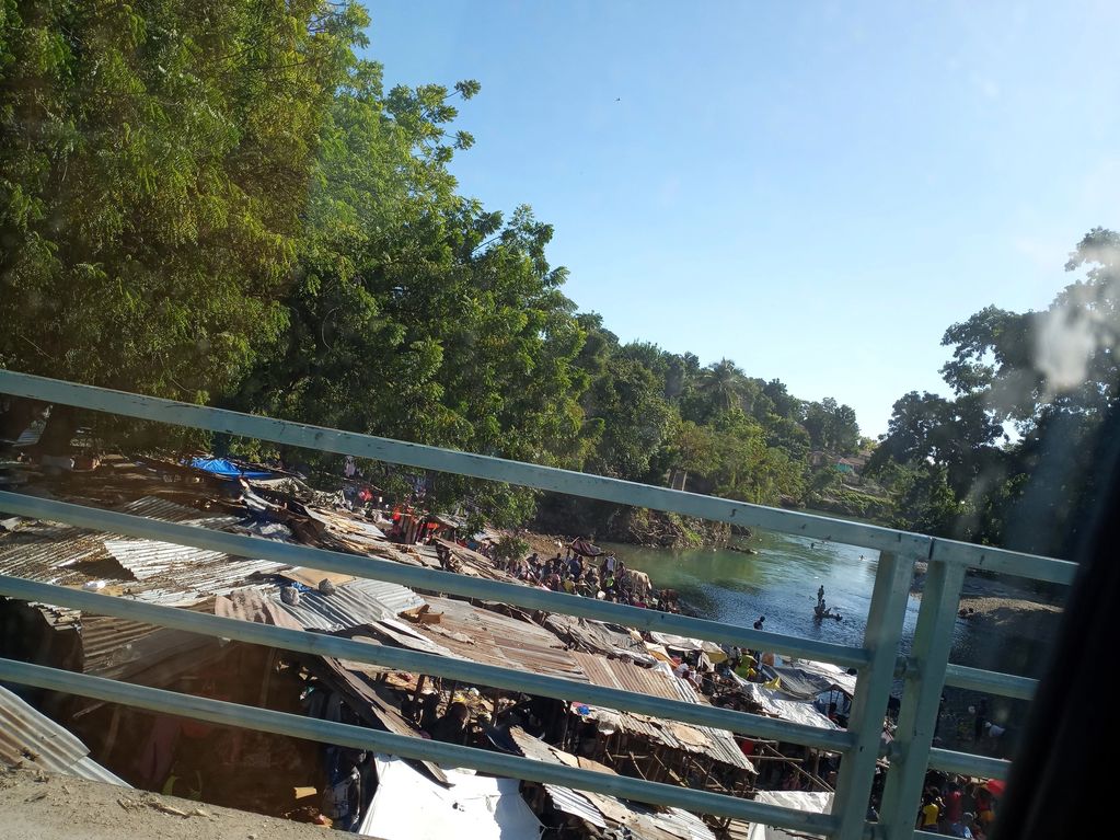 Haitian businessman selling on the River