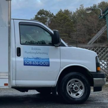 Robbins Plumbing and Heating company truck.