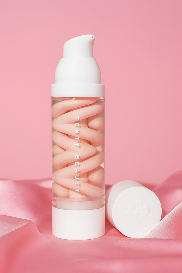 Fenty Beauty skincare product with a unique spiral design inside a clear bottle.