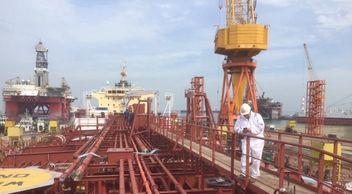 Performing asbestos survey on Tanker Singapore