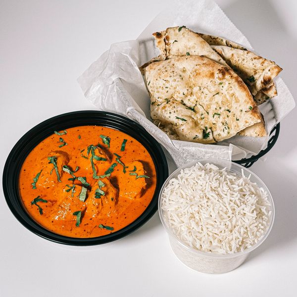 Indian curry, naan, and rice lunch combo from Mild 2 Spicy, part of our weekday lunch specials.