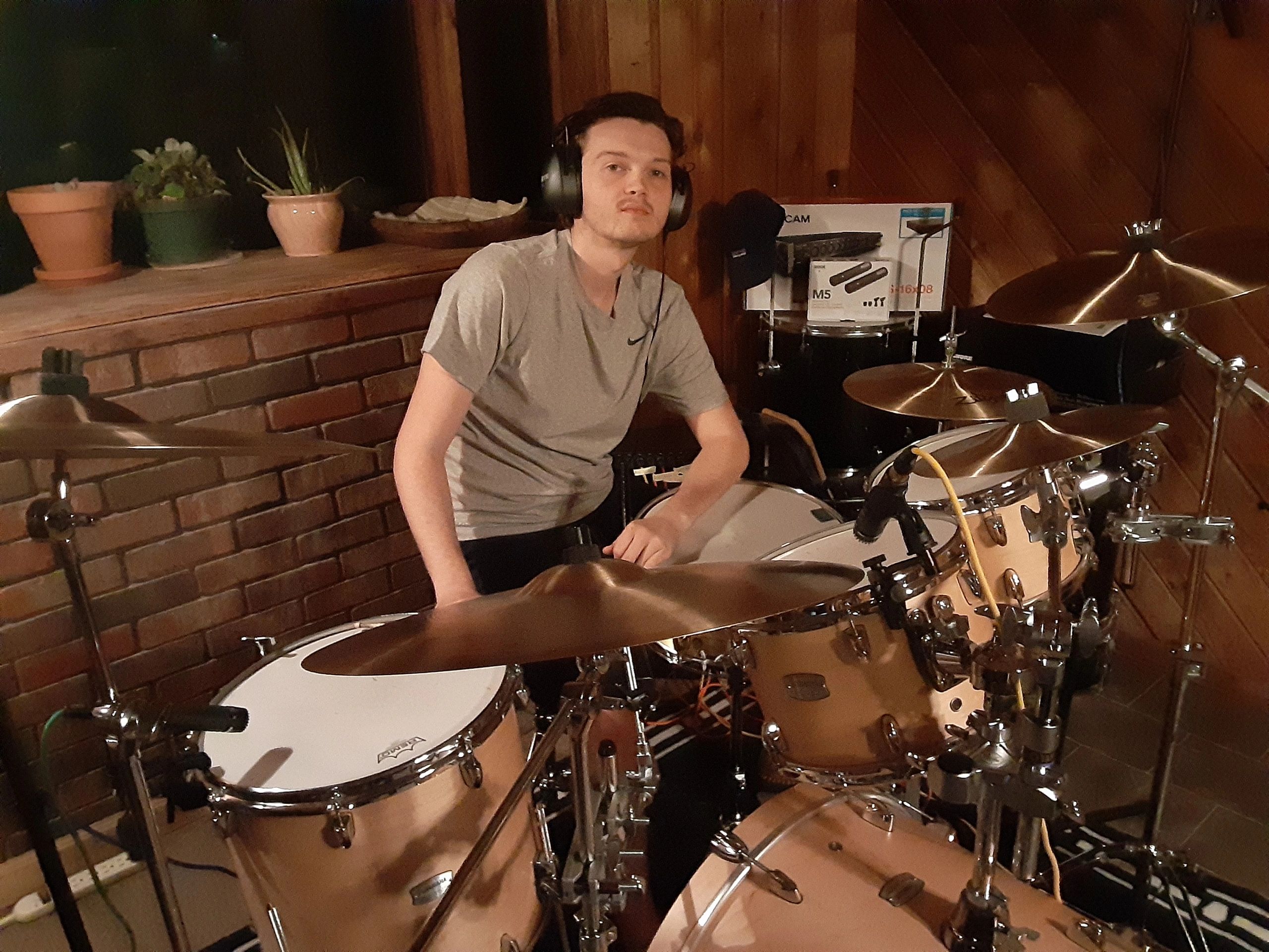 Austin Craft at his drum set before recording session for the song 'The Recent Future' -Atlas Before