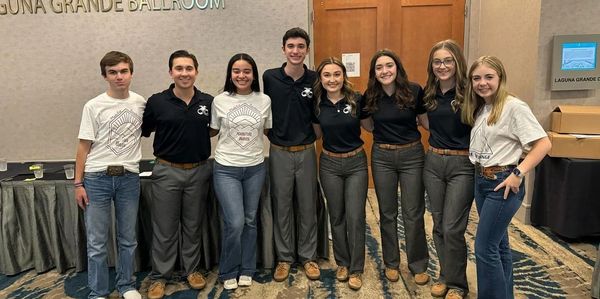 This picture is three officers from last year taking a picture with the 2023-2024 State officers aft